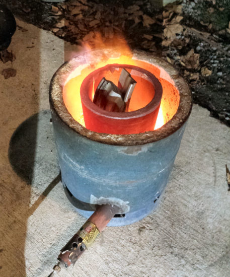 The DIY Propane furnace melting some scrap aluminium. 